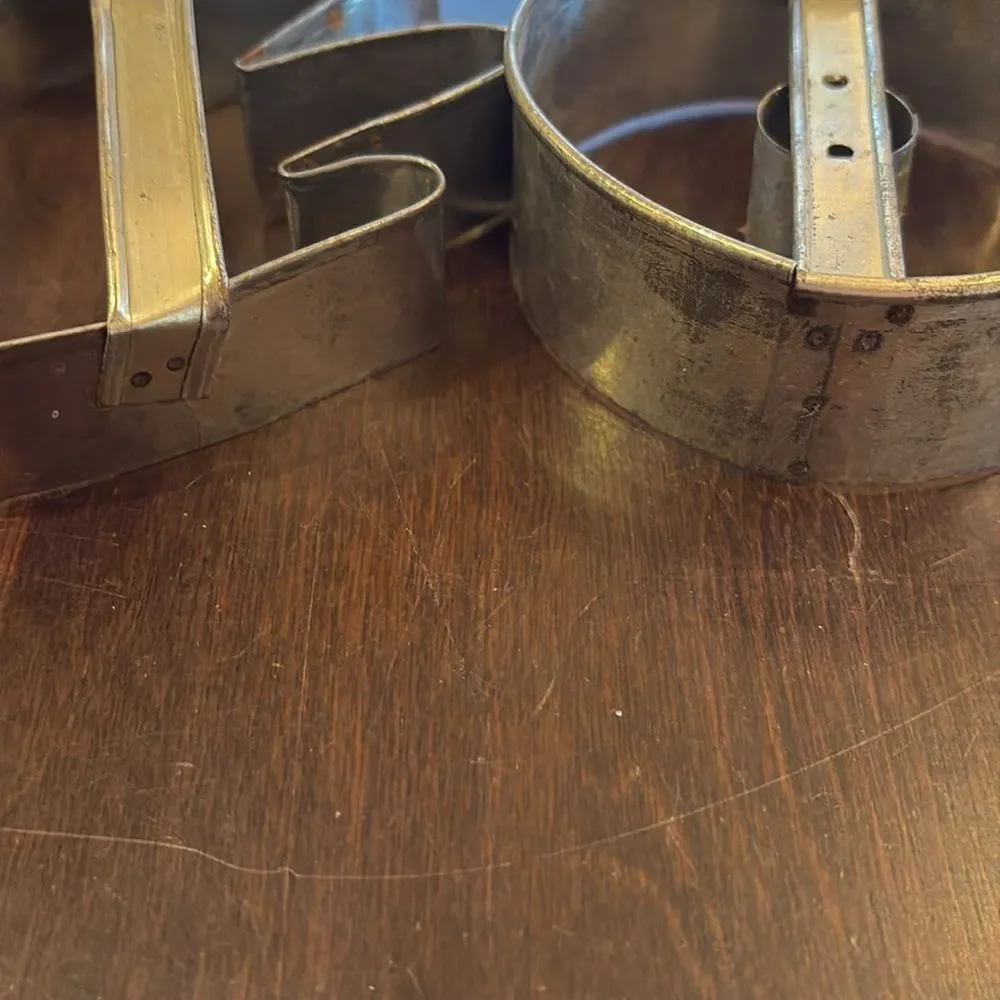 Vintage cookie cutters, hand and donut